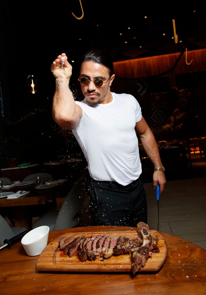 Salt Bae, also known as the “internet’s sexiest butcher,” came to global prominence in 2017 when an Instagram video of his signature sensual moves of preparing and seasoning (with salt!) a bone-in steak went viral. Tamara Beckwith/NY POST