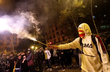 Separatists protest after a verdict in a trial over a banned Catalonia's independence referendum in Barcelona