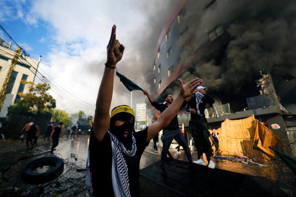 Protesters chant slogans in solidarity with the Palestinian people in Gaza, near the US embassy in Beirut, Lebanon (AP)