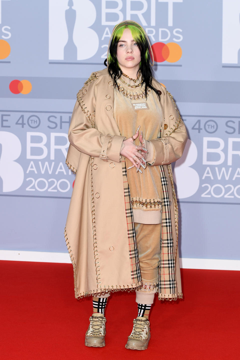 Billie Eilish says she wears baggy clothes to be comfortable and describes her relationship with her body as "toxic." (Photo by Gareth Cattermole/Getty Images)