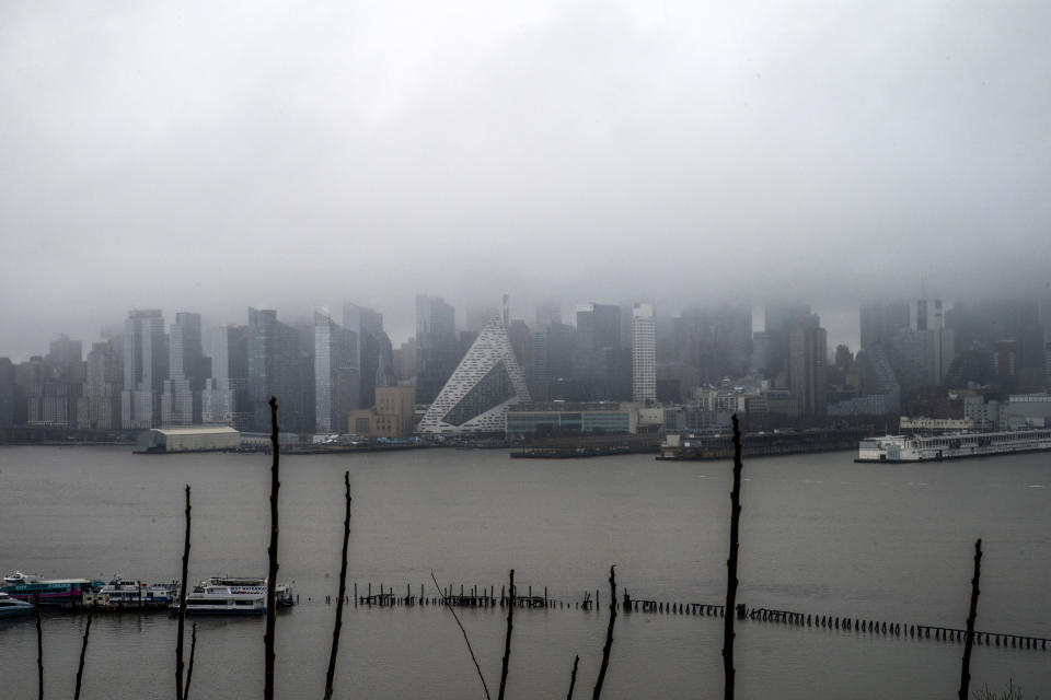 The Skyline of Middle Manhattan and up town are seen covered during a winter storm in New York as it is seen from Weehawken, New Jersey. Sunday, Jan. 7, 2024. (AP Photo/Eduardo Munoz Alvarez)