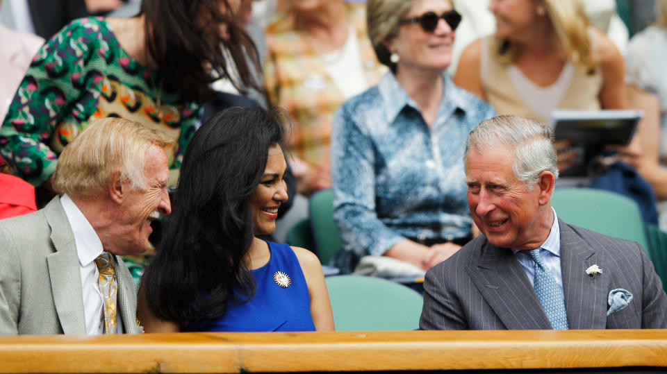 <p>Prince Charles is joined by the late Sir Bruce Forsyth alongside Lady Winnie Forsyth as they watch Roger Federer take on Fabio Fognini in 2012. (Getty Images)</p> 