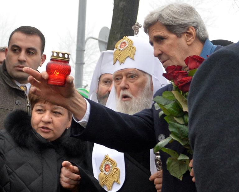 US Secretary of State John Kerry (R) and Ukraine's Patriarch Filaret, pictured in Kiev, on March 4, 2014