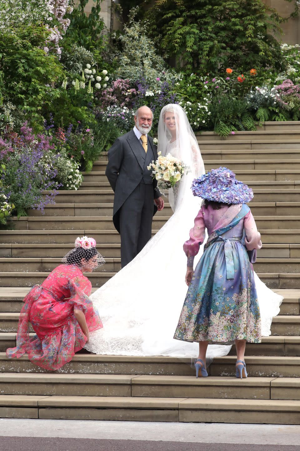 Lady Ella and her father pose on the steps of St George's Chapel