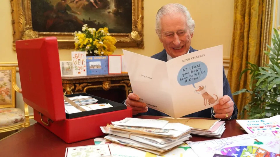 PHOTO: In this photo released on February 23, King Charles III reads cards and messages, sent by well-wishers following his cancer diagnosis, in the 18th Century Room of the Belgian Suite at Buckingham Palace, Feb. 21, 2024, in London, England.  (Jonathan Brady/Pool via Getty Images)