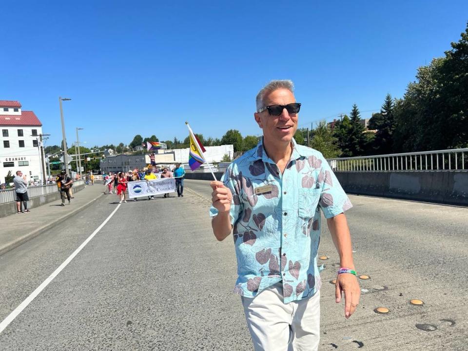 Bellingham Mayor Seth Fleetwood leads the Pride in Bellingham Parade up Chestnut Street on July 9.