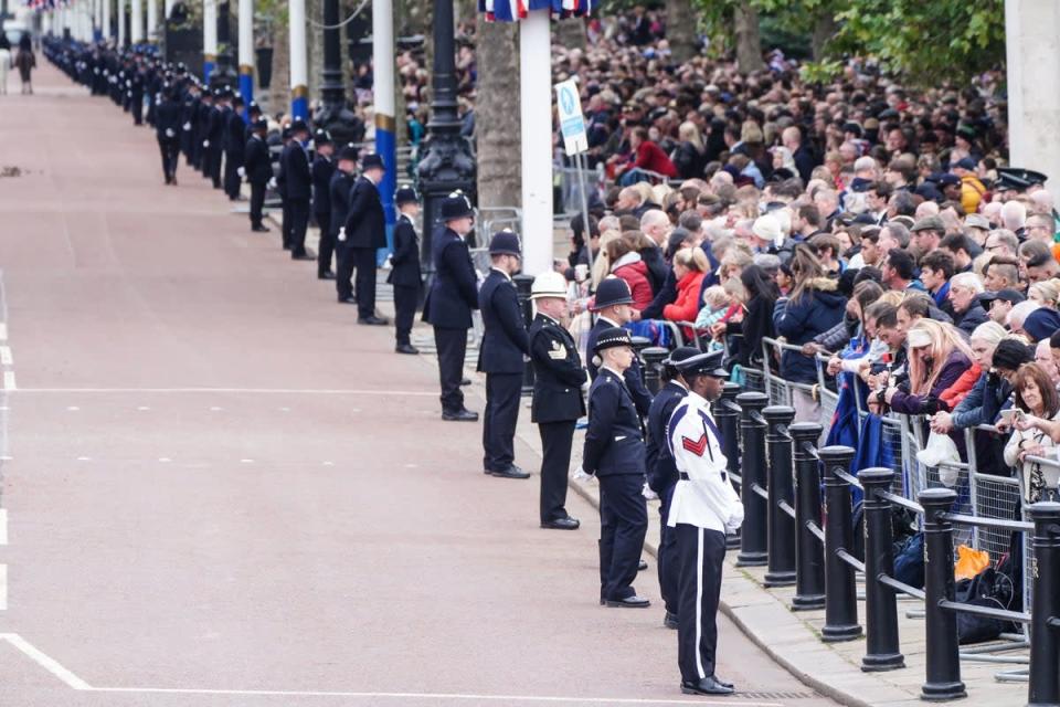 Police officers line The Mall in central London on the day of the funeral of Queen Elizabeth II at Westminster Abbey (Ian West/PA) (PA Wire)