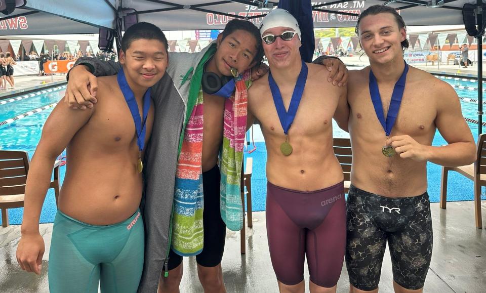 Oak Park's March Yuan (left to right), Elliott Drottar, Pablo Ingrum and Hunter Glass pose with their medals after winning the boys 400 freestyle relay at the CIF-SS Division 3 Swimming Championships on Friday, May 3, 2024, at Mount San Antonio College.