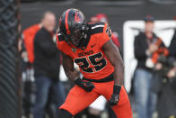Oregon State running back Isaiah Newell (25) celebrates after scoring a touchdown during the second half of an NCAA college football game on Saturday, Nov 26, 2022, in Corvallis, Ore. (AP Photo/Amanda Loman)