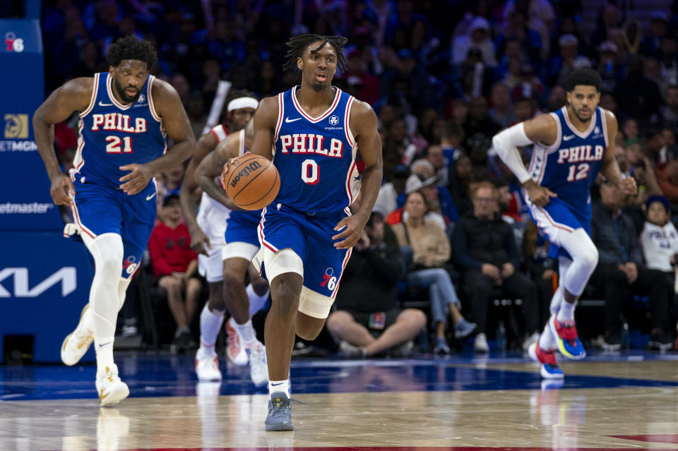 Philadelphia 76ers' Tyrese Maxey, center, brings the ball up the court during the NBA basketball game against the Portland Trail Blazers, Sunday, Oct. 29, 2023, in Philadelphia. The 76ers won 126-98. (AP Photo/Chris Szagola)