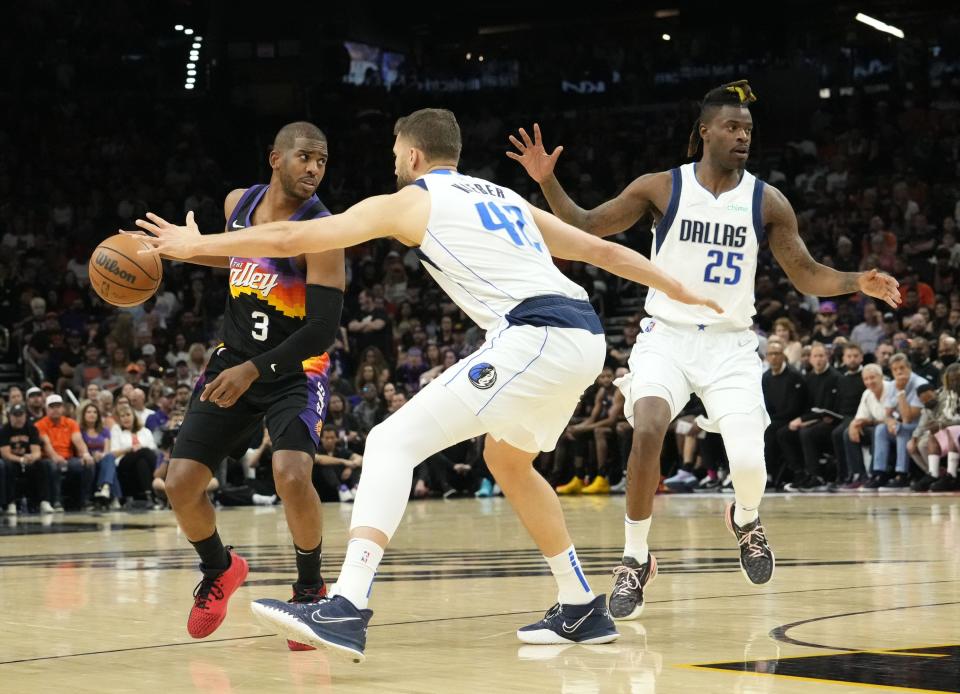 May 15, 2022; Phoenix, Arizona, USA; Phoenix Suns guard Chris Paul (3) is pressured by Dallas Mavericks forward Maxi Kleber (42) during game seven of the second round for the 2022 NBA playoffs at Footprint Center.