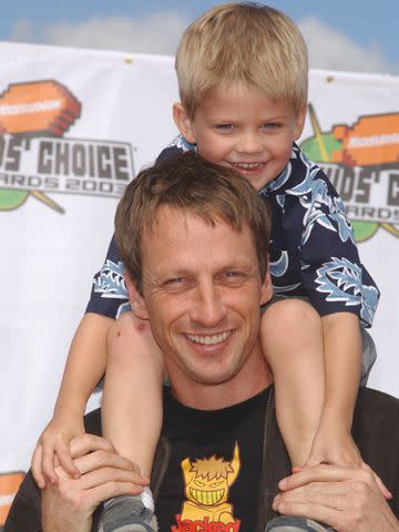 <p>Frank Trapper/Corbis/Getty</p> Tony Hawk and son Spencer at Nickelodeon's 16th Annual Kid's Choice Awards.