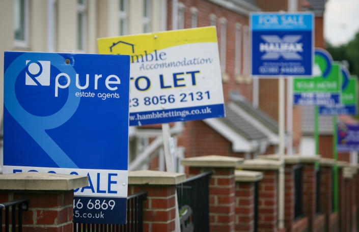 NEWPORT, UNITED KINGDOM - JUNE 12: Estate agent for sale and to let signs are seen outside residential houses, on June 12, 2022 in Newport, England. According to a report from the Royal Institution of Chartered Surveyors (RICS) soaring interest rates and falling prices will mark the end of the UK&#x002019;s 13-year housing market boom potentially leading to a house price crash. (Photo by Matt Cardy/Getty Images)