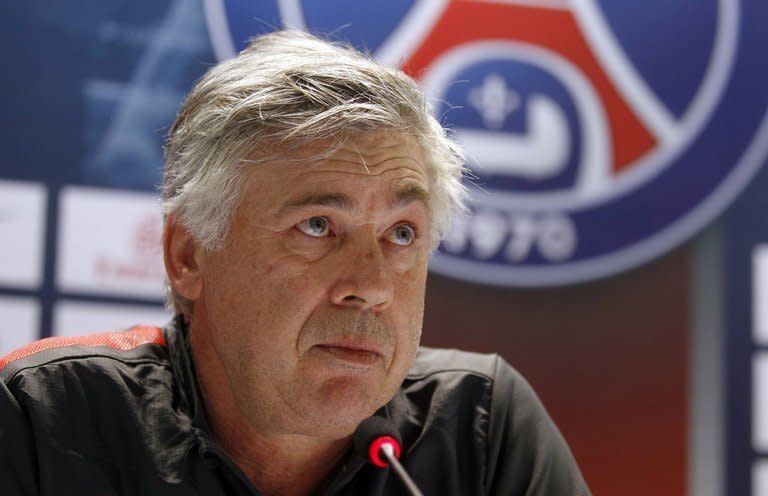 Paris Saint-Germain's Italian coach Carlo Ancelotti holds a press conference at the Aspire Academy of Sports Excellence in the Qatari capital Doha on December 29, 2012. Ancelotti has ruled out any further signings during the January transfer window, saying the arrival of Brazilian starlet Lucas Moura would suffice