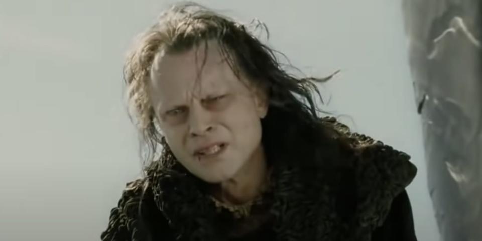 Grima wormtongue in black outfit in lord of the rings