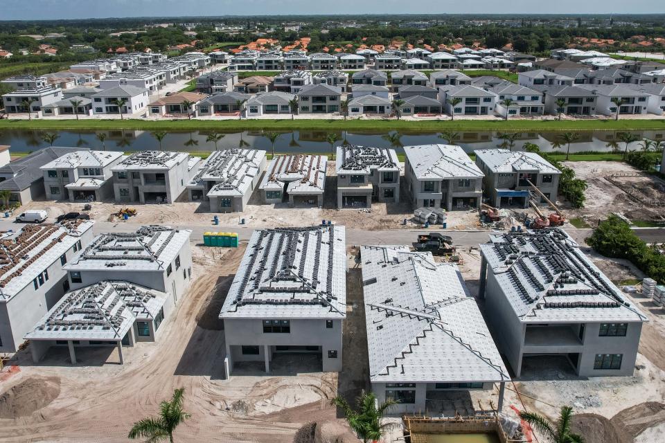 Ongoing construction of residences at the site of the Lotus Palm community on Wednesday, July 12, 2023, in Boca Raton, Fla.
