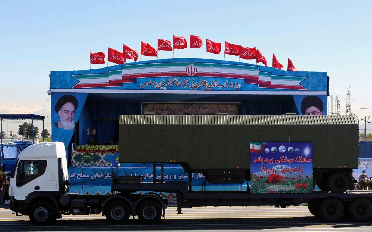 An Iranian military truck carries parts of the S300 missile system during the Army Day parade in Tehran  - AFP or licensors