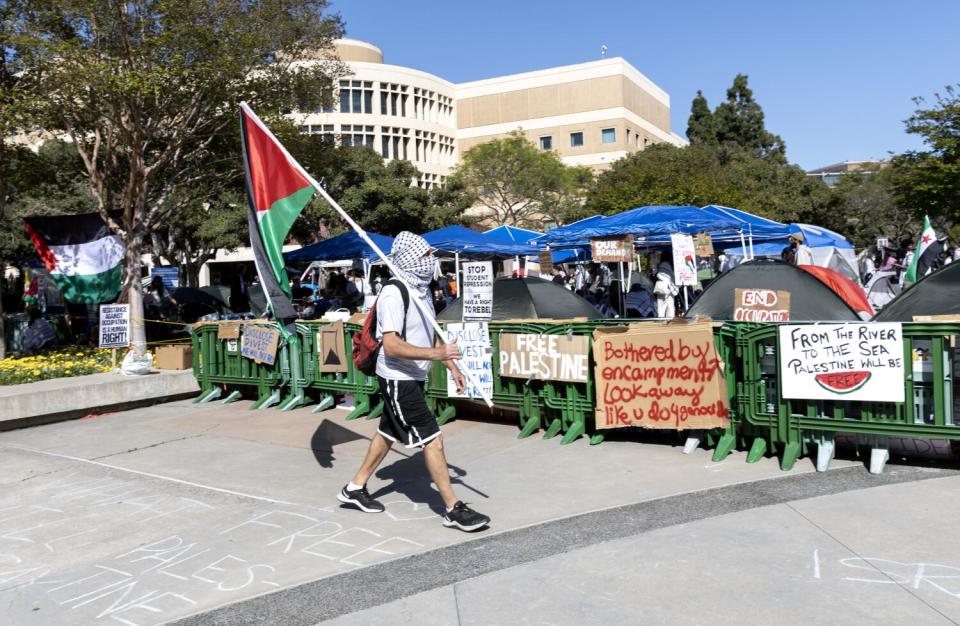 Pro-Palestinian protesters form an encampment at UC Irvine.