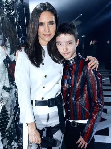 <p>Rindoff/Le Segretain/Getty </p> Jennifer Connelly and her son Stellan Bettany attend the Louis Vuitton show as part of the Paris Fashion Week Womenswear Fall/Winter 2016/2017 on March 9, 2016.