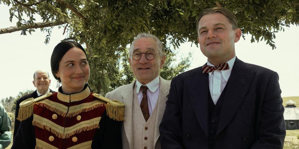 Lily Gladstone, Robert De Niro and Leonardo DiCaprio in "Killers of the Flower Moon."