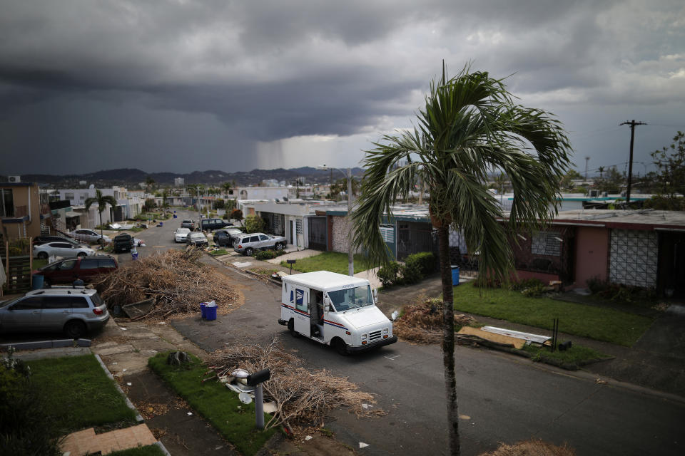 <p>A U.S. Postal Service truck is seen at an area damaged by Hurricane Maria in San Juan, Puerto Rico, in the island of Vieques, Puerto Rico, Oct. 6, 2017. (Photo: Carlos Barria/Reuters) </p>