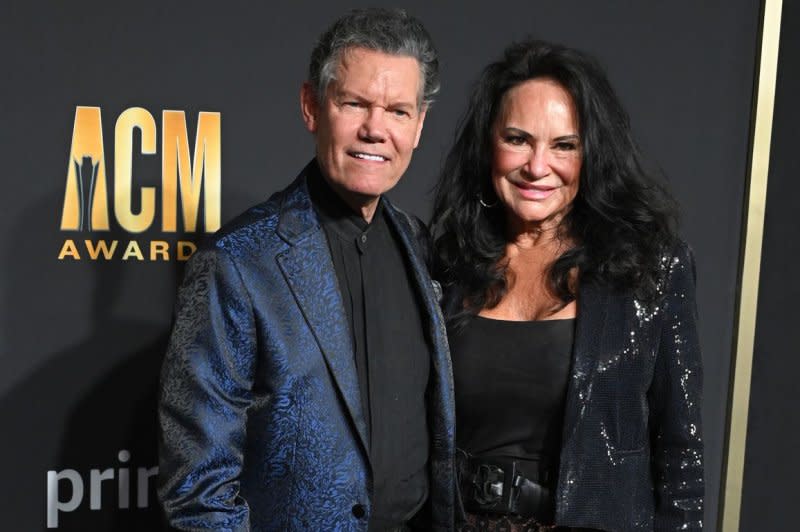 Randy Travis and Mary Davis arrive on the red carpet for the 2023 Academy of Country Music Awards at The Star in Frisco, Texas, on May 11. File Photo by Ian Halperin/UPI