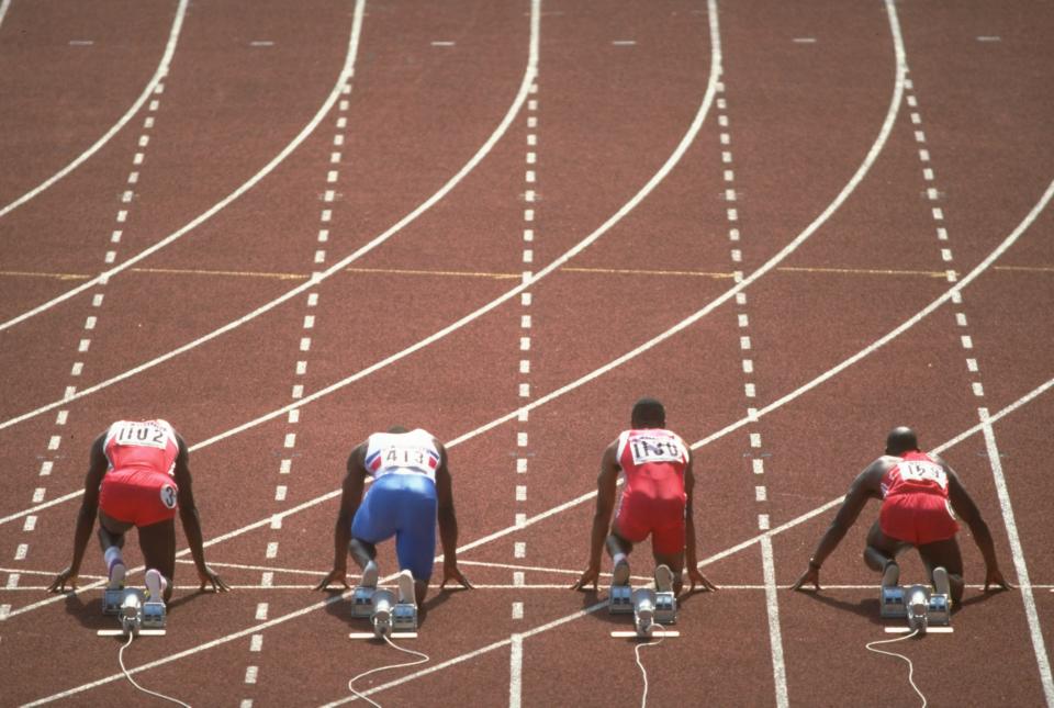 28 Sep 1988: Carl Lewis (left) of the USA, Linford Christie (seond left) of Great Britain, Calvin Smith (second right) of the USA and Ben Johnson (right) of Canada at the start of the 100 Metres Final at the 1988 Olympic Games in Seoul, South Korea. Lewis won the gold medal Christie won the silver and Smith won the bronze medal in this event. Johnson was disqualified for failing a drugs test. \ Mandatory Credit: Steve Powell/Allsport