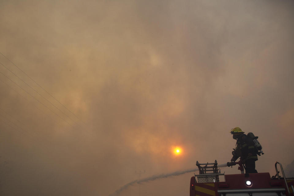 Massive wildfires tear across Israel