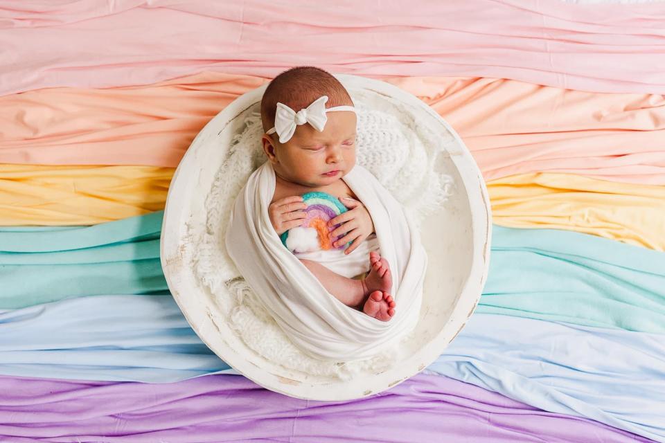 Emryn Bostic is a double rainbow baby for parents Alyssa and Brian Bostic. She was born after the couple suffered miscarriages. GLITTER AND GRACE PHOTOGRAPHY