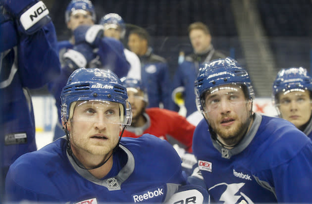 Tampa Bay Lightning center Steven Stamkos (91) and defenseman Victor Hedman (77) huddle up with the team while back at practice with the team at Amalie Arena in Tampa fresh off their appearance at the World Cup. (Dirk Shadd/The Tampa Bay Times via AP)