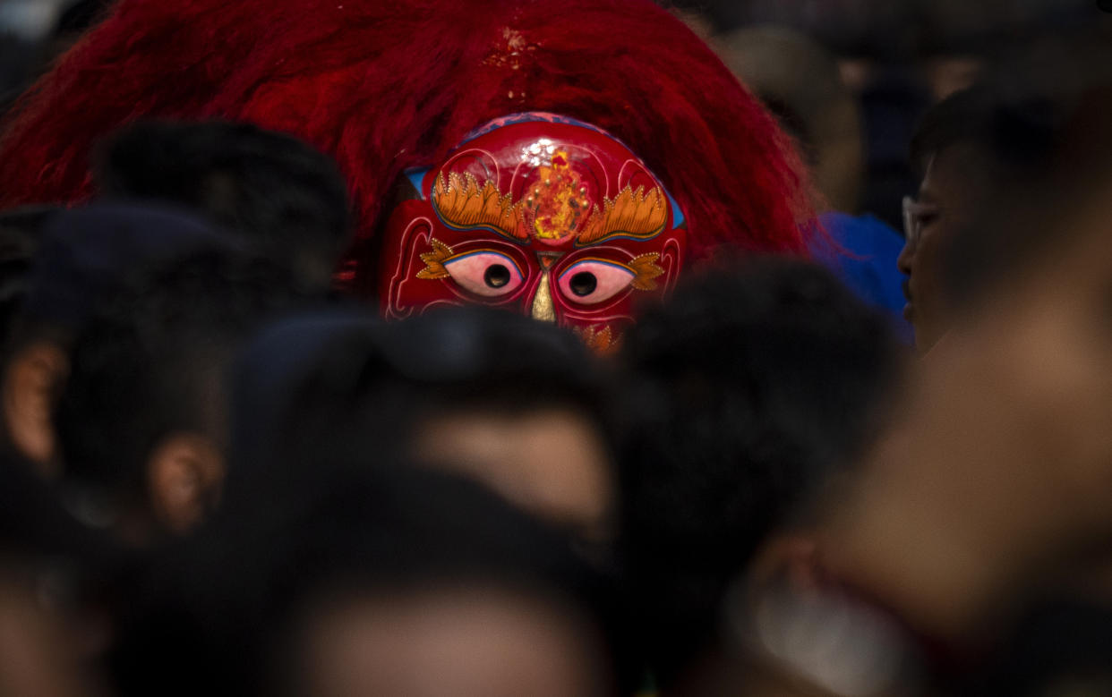 The Lakhe, a demon adored for divine might, performs during Indra Jatra, a festival that marks the end of the rainy season in Kathmandu, Nepal, Tuesday, Sept. 17, 2024. (AP Photo/Niranjan Shrestha)