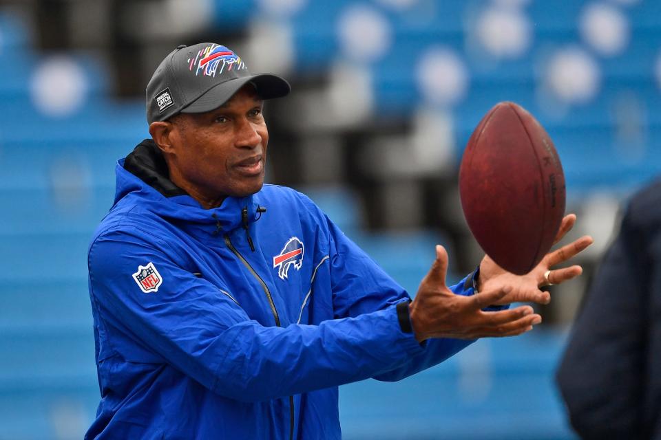 FILE - Buffalo Bills defensive assistant Leslie Frazier catches a ball before an NFL football game against the Houston Texans, Sunday, Oct. 3, 2021, in Orchard Park, N.Y. Leslie Frazier expected another opportunity to be a head coach in the NFL after a three-year-plus stint in Minnesota from 2010-13. Frazier, the Buffalo Bills' 63-year-old defensive coordinator, is still waiting for that second chance while doing his best to help young coaches advance their careers. (AP Photo/Adrian Kraus, File)