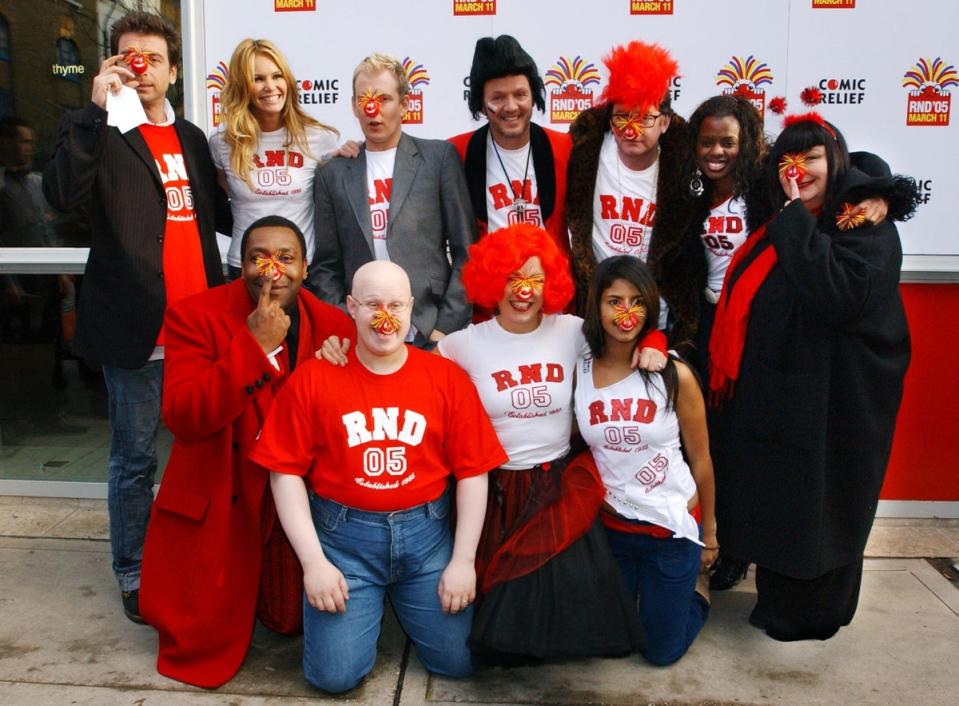 Henry pictured in 2005 with Front row, from left to right; Matt Lucas, Davina McCall and Konnie Huq, back row, from left to right; Nick Knowles, Elle MacPherson, Patrick Kielty, Kevin Whately, Chris Evans, June Sarpong and Dawn French (PA)