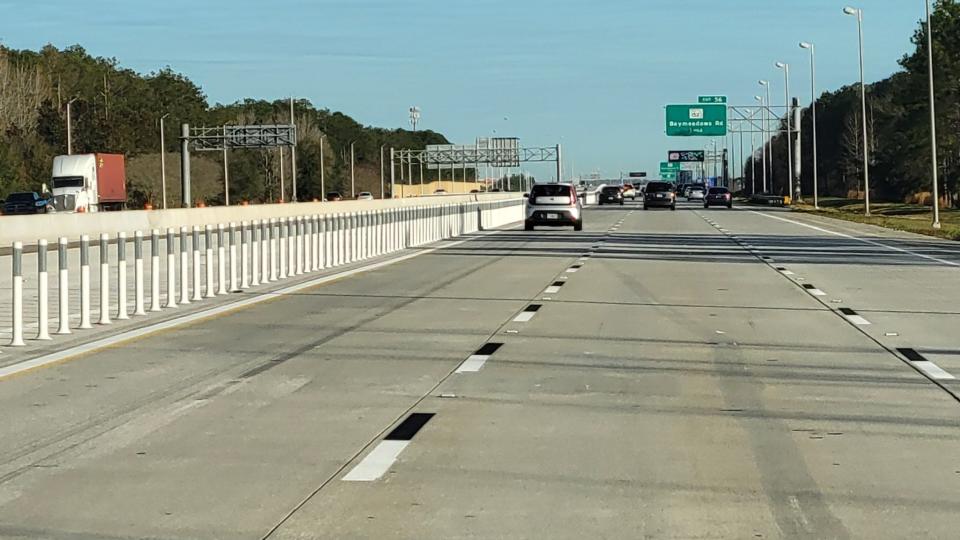 Lane dividers mark the new I-295 East Beltway managed lane on southbound I-295 nearing Baymeadows Road.