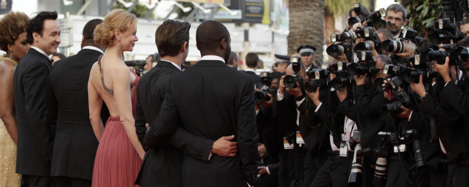 Cast members from left, Macy Gray, John Cusack, director Lee Daniels, Zac Efron, and David Oyelowo arrive for the screening of The Paperboy at the 65th international film festival, in Cannes, southern France, Thursday, May 24, 2012. (AP Photo/Virginia Mayo)