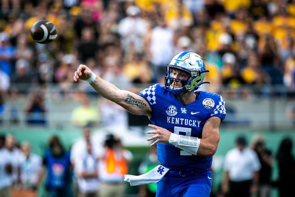 Kentucky quarterback Will Levis (7) throws during a NCAA college football game in the Vrbo Citrus Bowl against Iowa, Saturday, Jan. 1, 2022, at Camping World Stadium in Orlando, Fla.