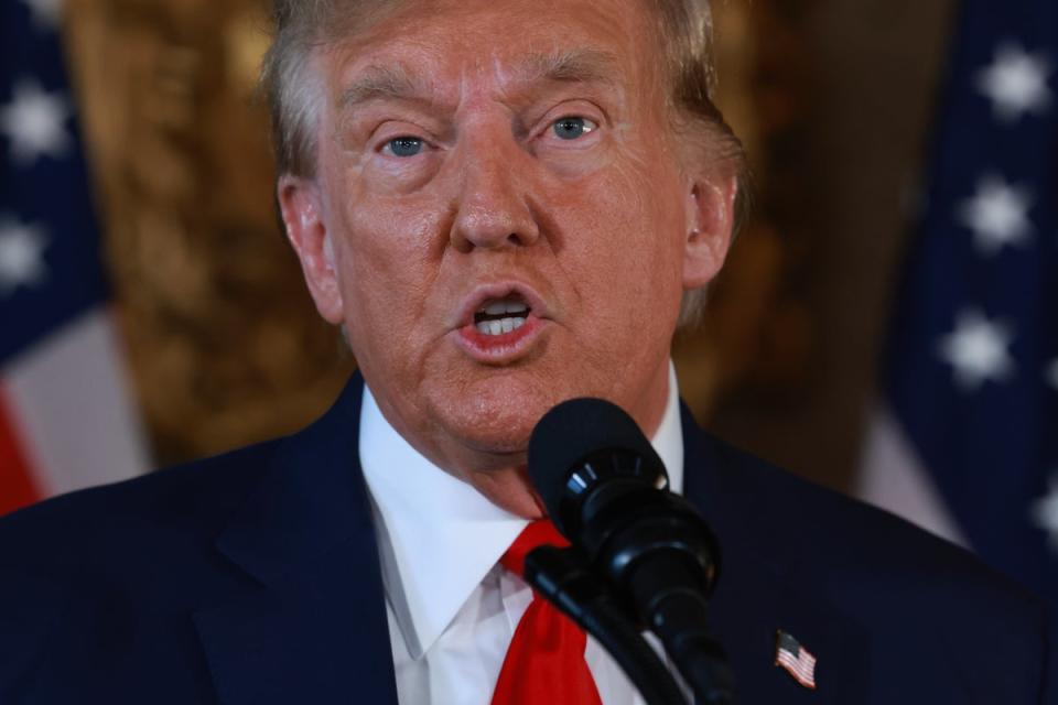 The super PAC for Donald Trump, pictured speaking at his Mar-a-Lago estate, has launched a TikTok account after the former president spoke out against a ban on the social media platform (Getty Images)