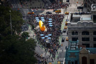 People watch the solar eclipse from Madison Square in midtown Manhattan in New York City. REUTERS/Brendan McDermid