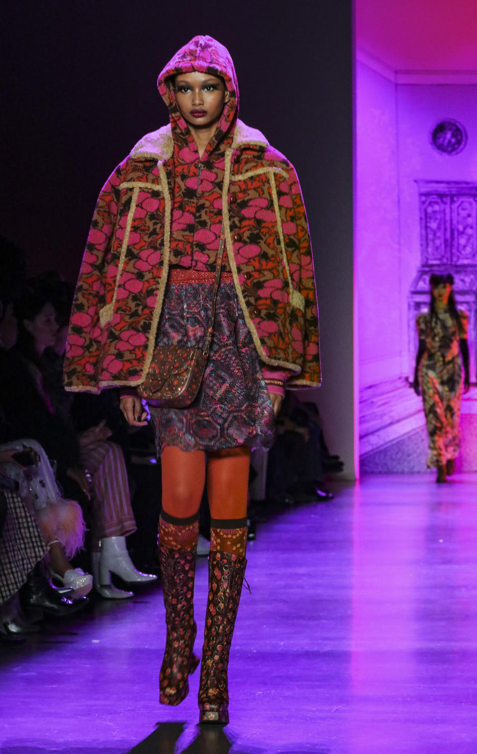 The latest fashion creation from Anna Sui is modeled during New York's Fashion Week, Monday, Feb. 10, 2020. (AP Photo/Bebeto Matthews)