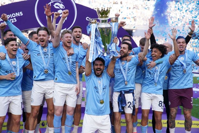 Manchester City’s Ilkay Gundogan lifts the Premier League trophy 