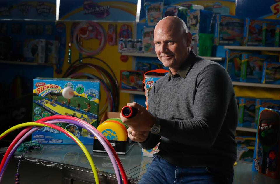 Wham-O president Todd Richards with toys