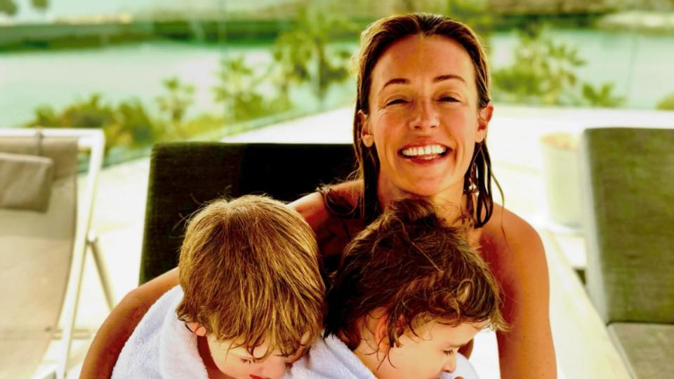 Cat Deeley with her two sons on a deckchair