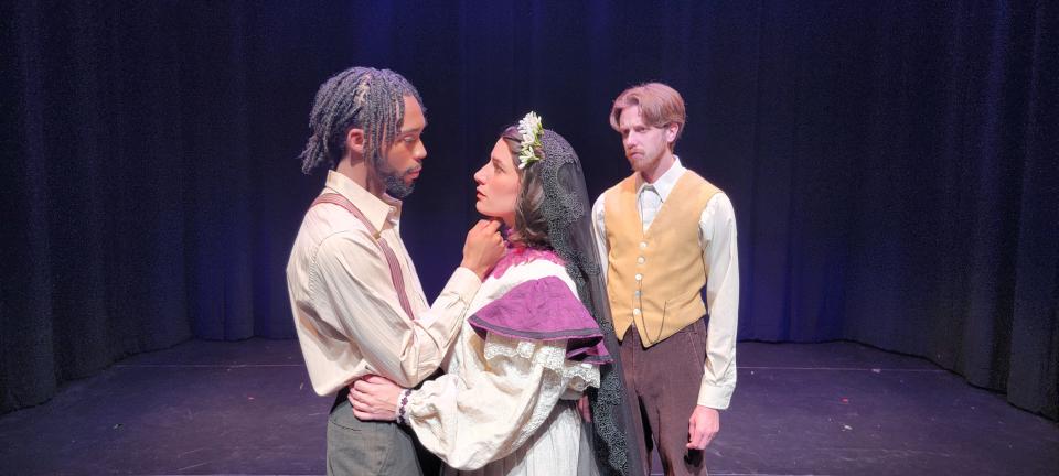 Left to right, Jalen Carr as Leonardo, Shannon McCarren as Bride and Noah Bennett as Bridegroom in the Ohio State University Department of Theatre, Film, and Media Arts’ production of "Blood Wedding."