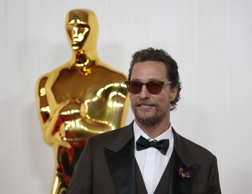 FILE - Matthew McConaughey arrives at the Oscars, March 10, 2024, at the Dolby Theatre in Los Angeles. New Mexico is standing in for California in a new film starring McConaughey, as Jamie Lee Curtis’ production company and others tell the story of a bus driver and a school teacher who rescued students during the deadliest and most destructive wildfire in California’s history. (AP Photo/Ashley Landis, File)