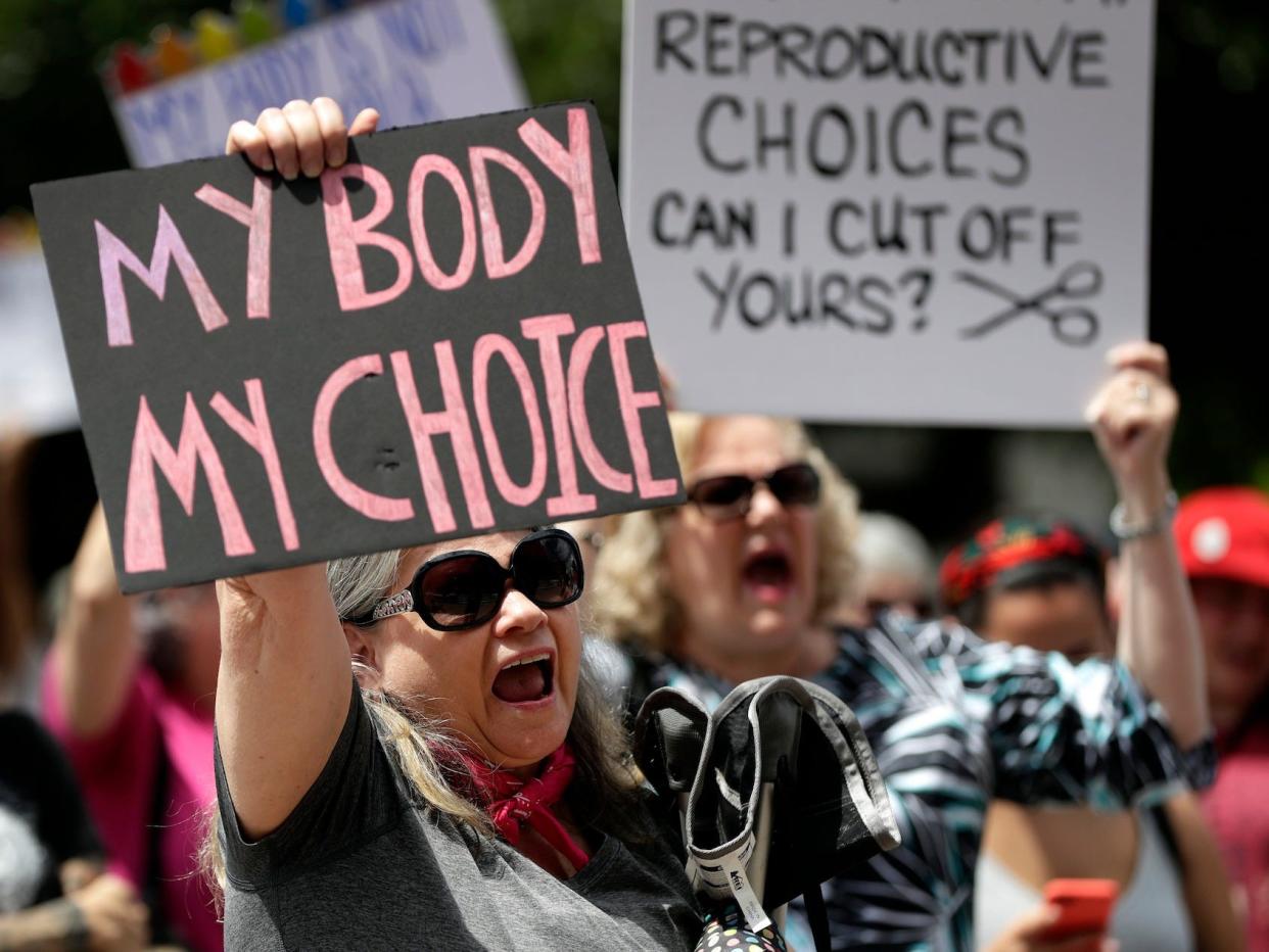 Demonstrators gather to protest abortion restrictions at the Texas State Capitol in Austin on May 21, 2019.