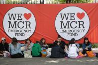 <p>Fans lined the streets from early on Sunday morning to secure their place at the show. (PA) </p>