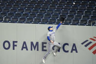 Toronto Blue Jays Cavan Biggio chases a ball hit by New York Yankees' DJ LeMahieu for a home run during the first inning of a baseball game Wednesday, Sept. 16, 2020, in New York. (AP Photo/Frank Franklin II)