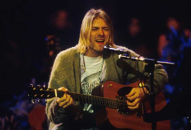 <p>Cobain fue encontrado muerto, a causa de una herida de bala, junto a una nota suicida en su casa de Seattle en 1994</p> (Getty)