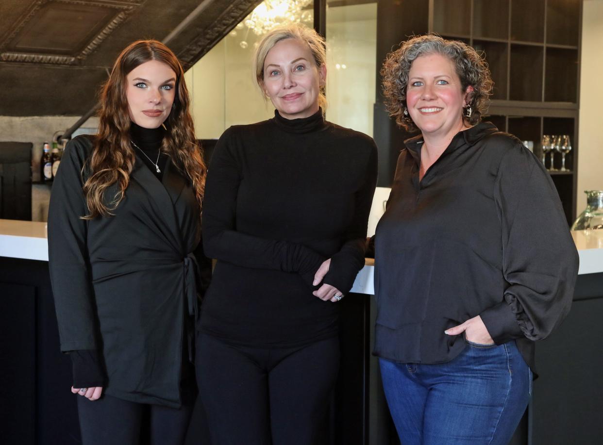 Kayla Evans, Angela Franklin and Crystal Gibson pose together inside the Uptown Indigo on North Lafayette Street in Shelby.