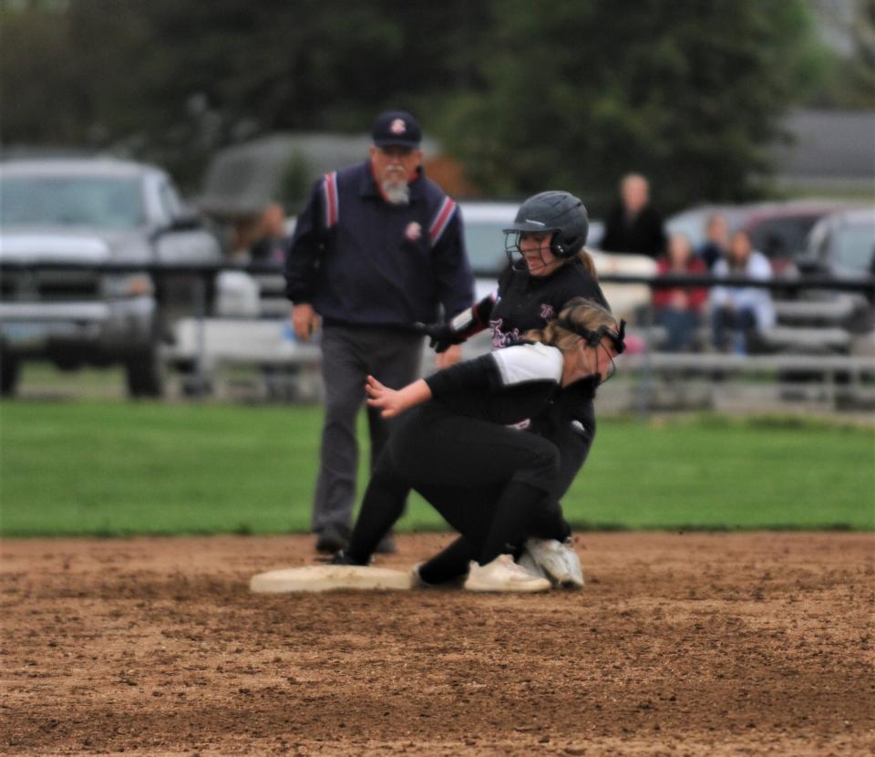 Ridgewood shortstop Maggie Shannon tags out a Tusky Valley runner trying to steal second during a loss earlier this season. Shannon made second team All-IVC.